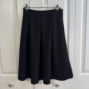 Park Avenue black pleated pull on skirt‎
